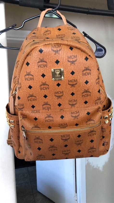 how to spot fake mcm bag|spotting a genuine mcm bag.